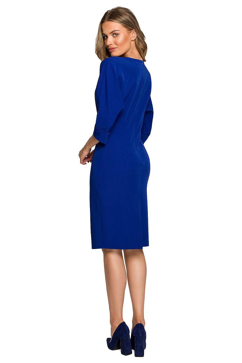 Blue day dress back view with 3/4 sleeves and crew neckline, knee length.