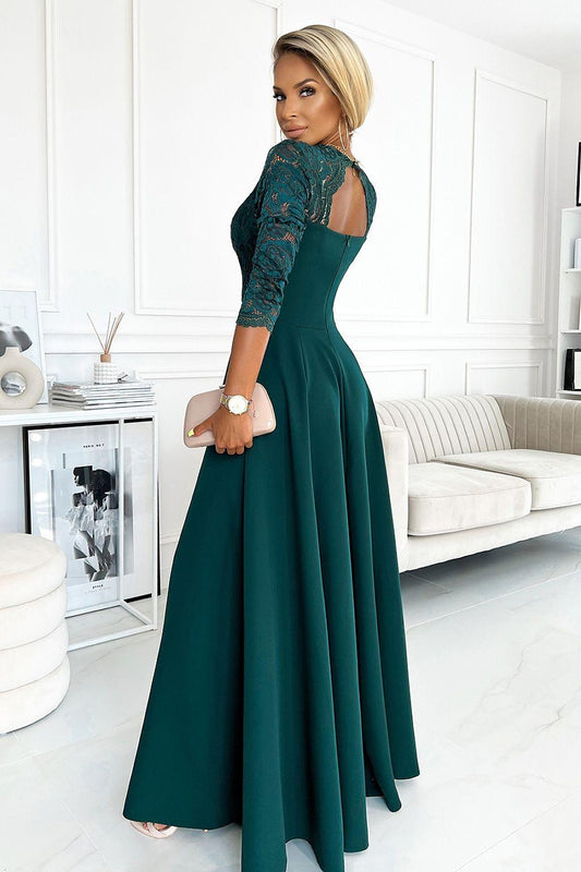 Long teal lace dress with back cutout and three-quarter sleeves, flared skirt