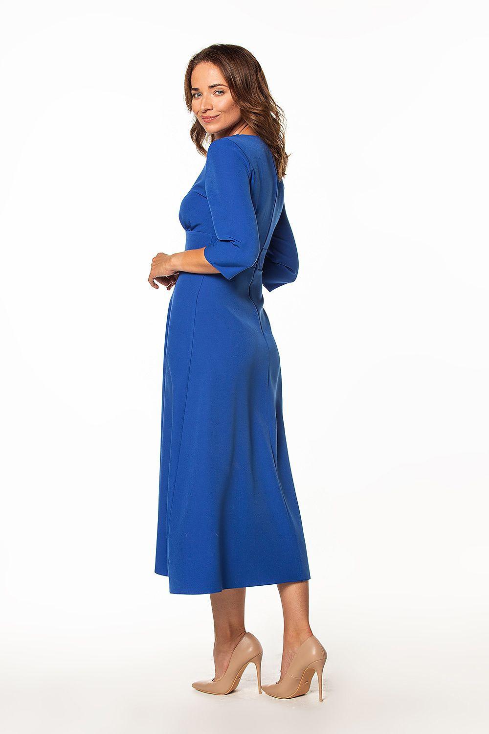 Blue V-neck midi daydress with 3/4 sleeves, side view