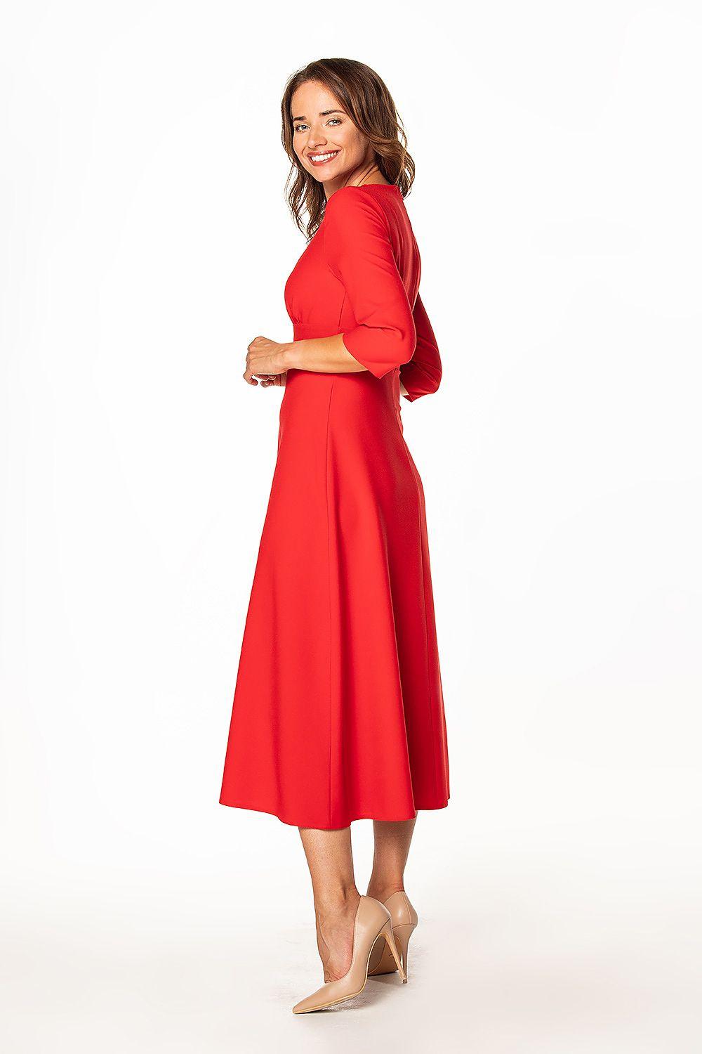 Red V-neck daydress with three-quarter sleeves, side view A-line midi skirt