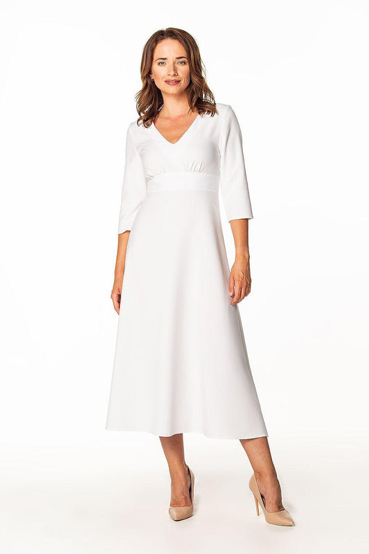 White daydress with V-neck, elbow-length sleeves and midi skirt