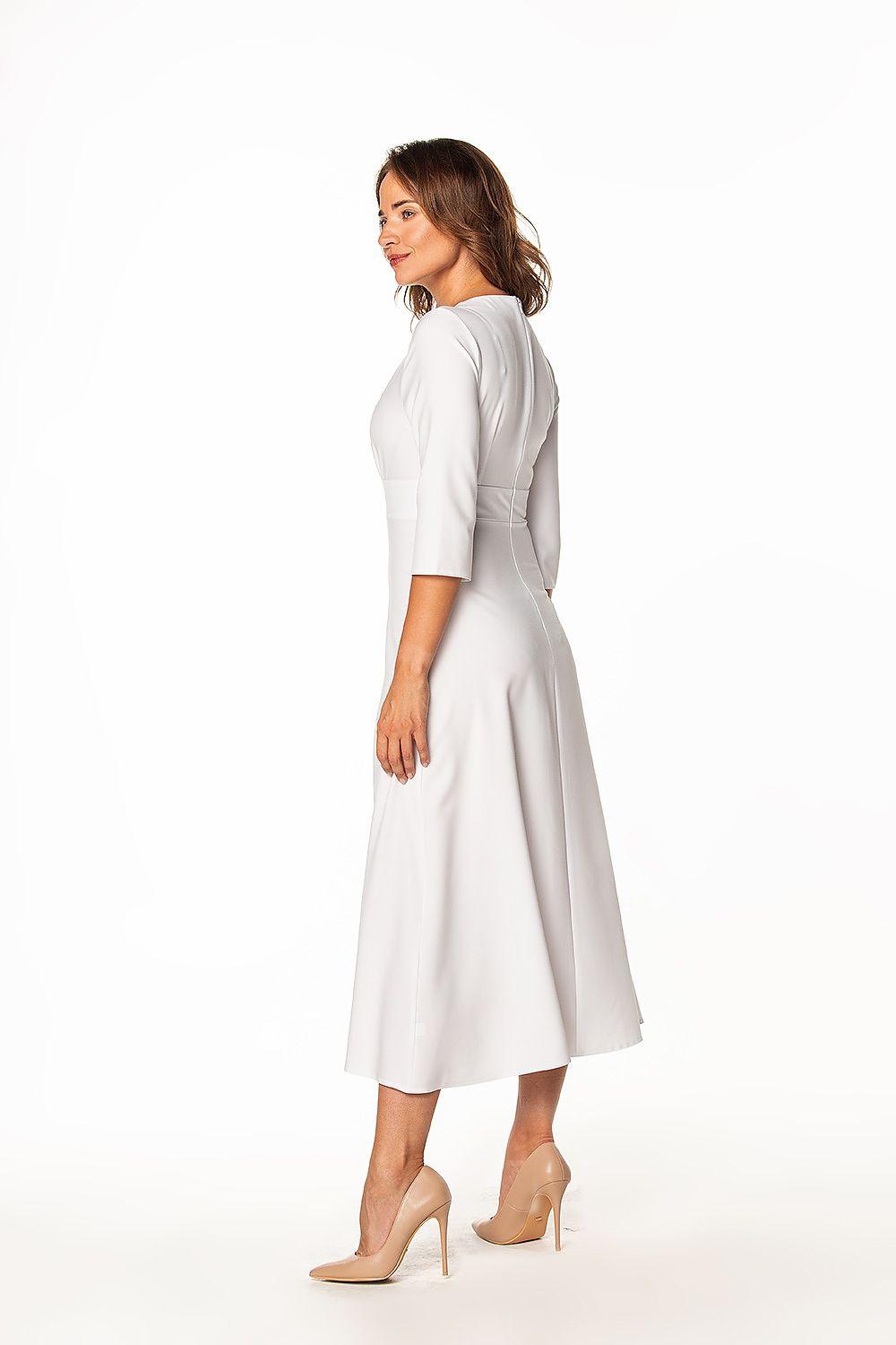 White V-neck daydress side view with 3/4 sleeves and flared midi skirt