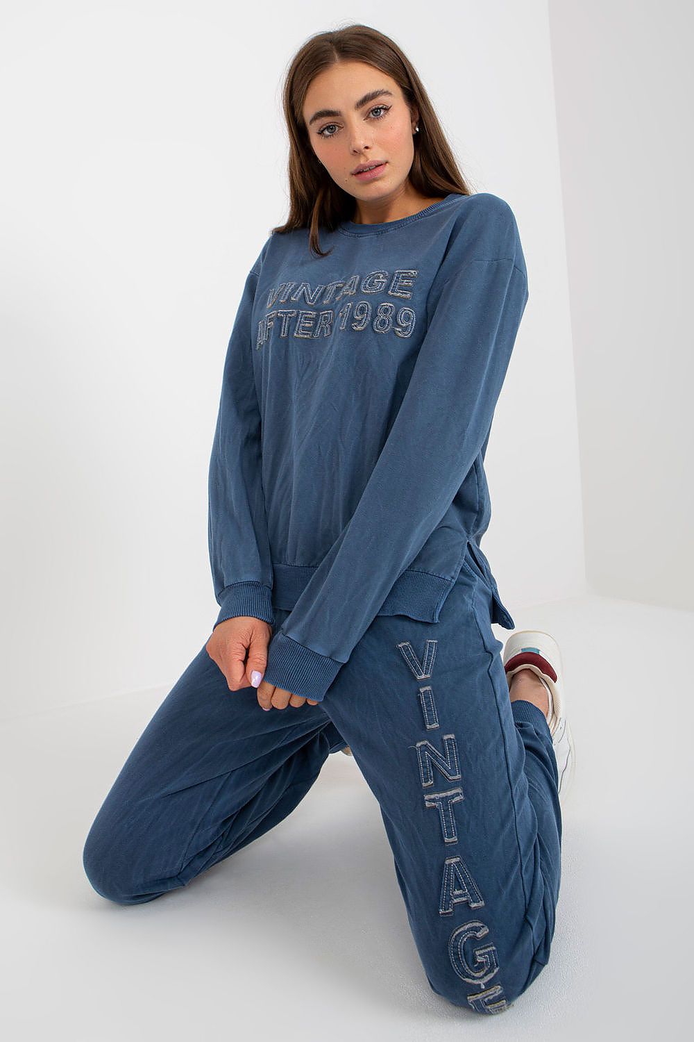 Blue women's sweatshirt and jogger set with front lettering