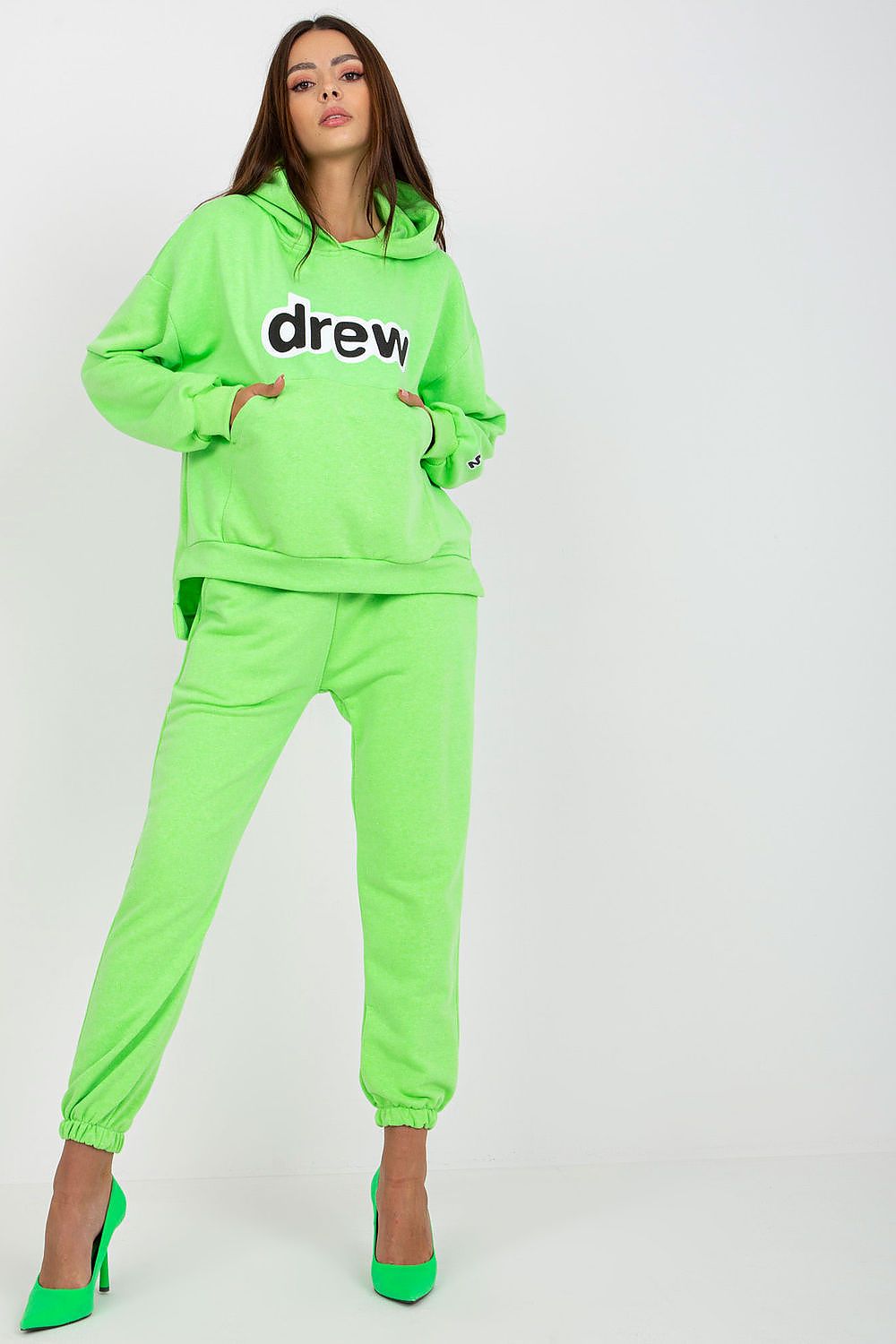 Green women’s hoodie and jogger set with front kangaroo pocket