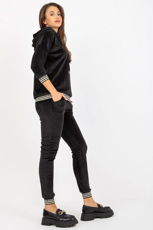 Black hoodie and jogger set, side view, drawstring and striped cuffs