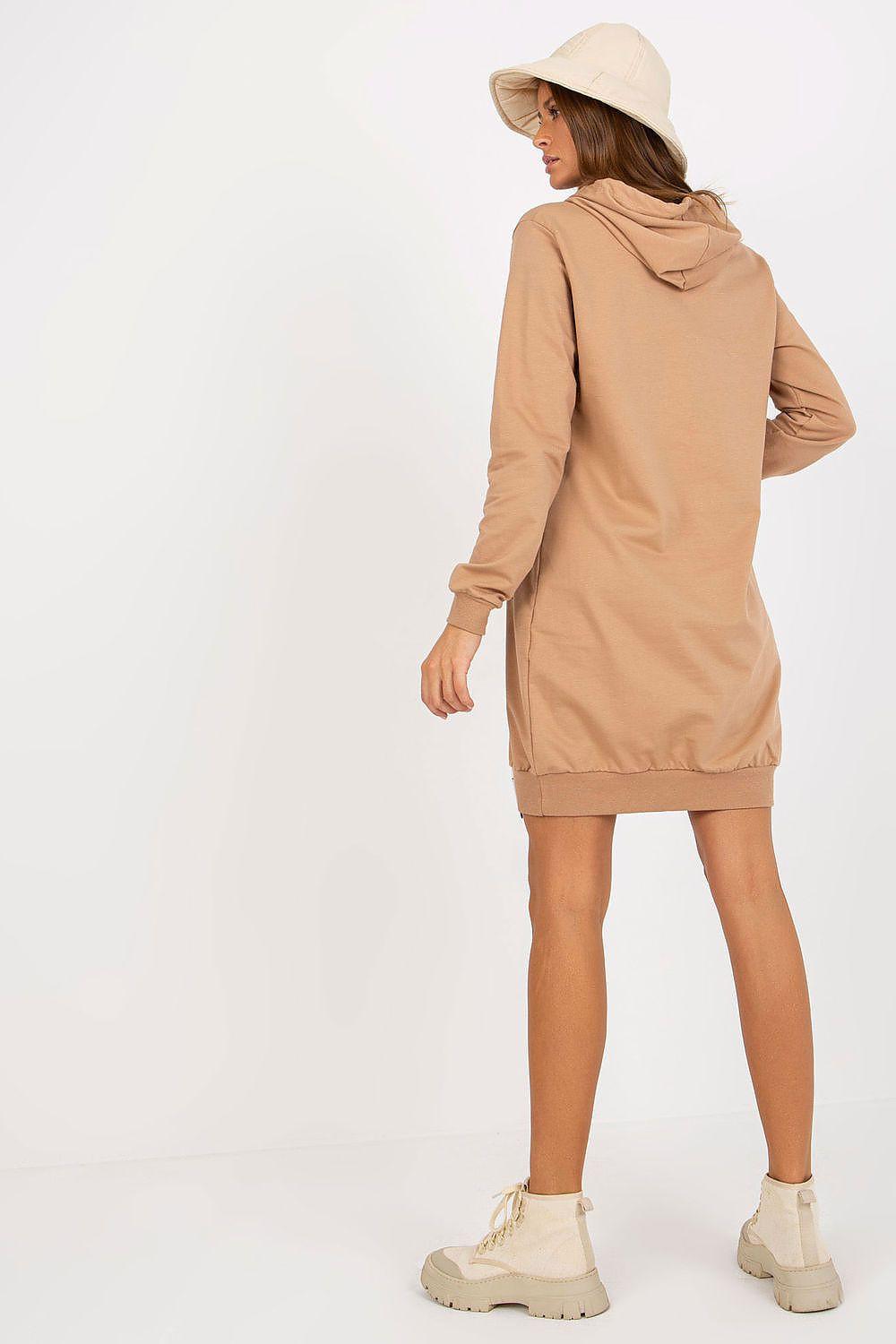 Hooded tan daydress with drawstring, long sleeves and short hem, back view