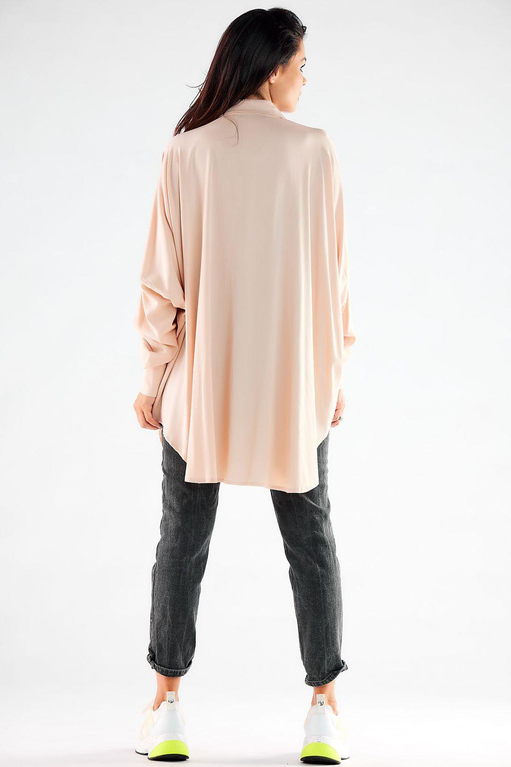 Beige long-sleeve shirt by awama, back view with rounded hem and straight yoke seams.