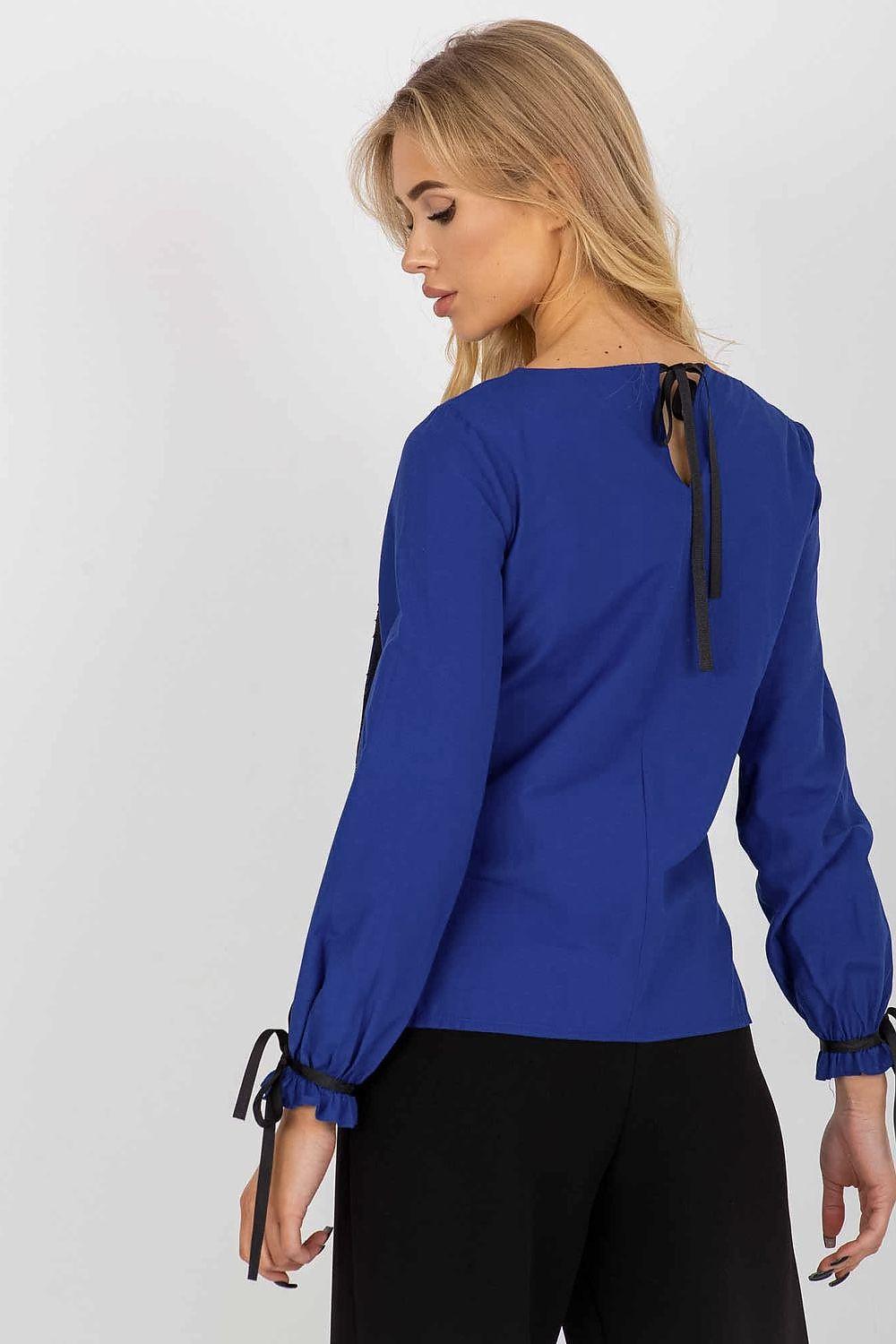 Blue blouse back view with buttoned yoke and tie bow details, long sleeves.