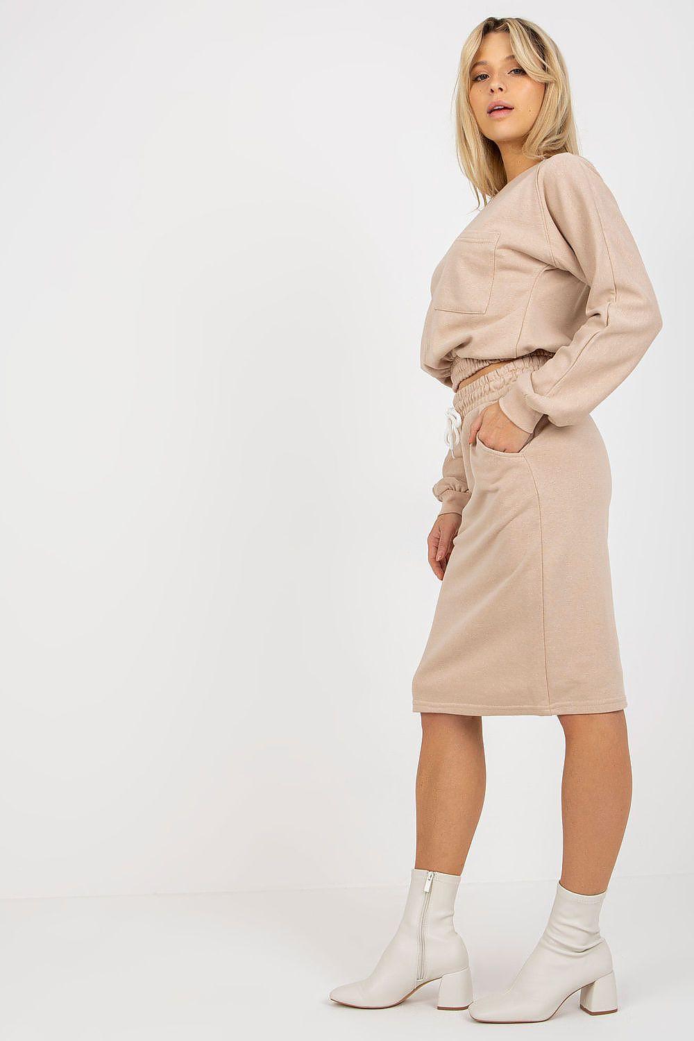 Beige skirt tracksuit set, side view: long-sleeve top and midi skirt with drawstring waist