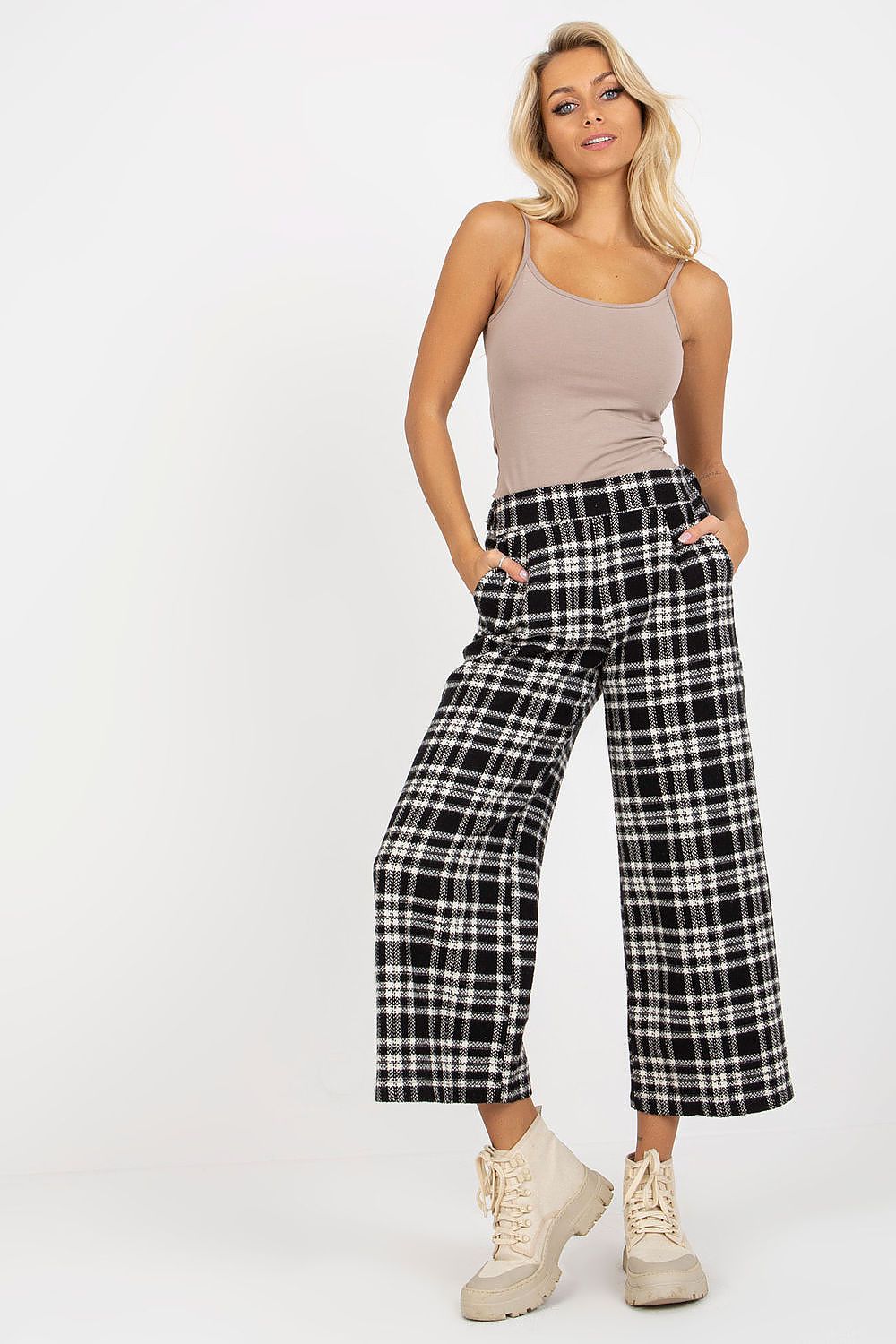 Black and white checkered wool trousers with wide-leg fit and high waist