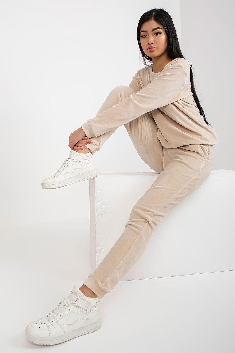Beige velour loungewear set with long-sleeve top and slim jogger pants