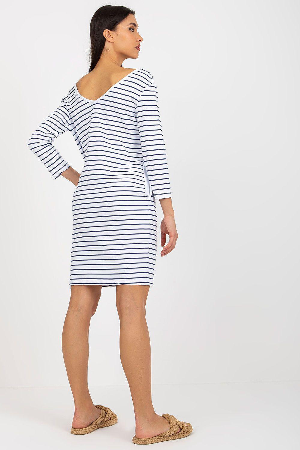 Striped white daydress with long sleeves and scoop neckline, straight hem
