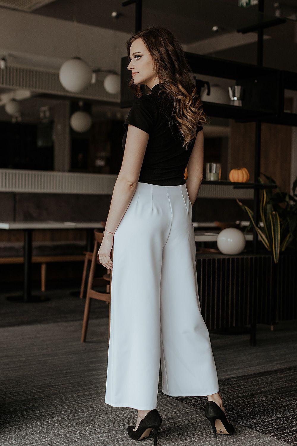 White wide-leg 7/8 trousers, side view, solid fabric with relaxed wide legs