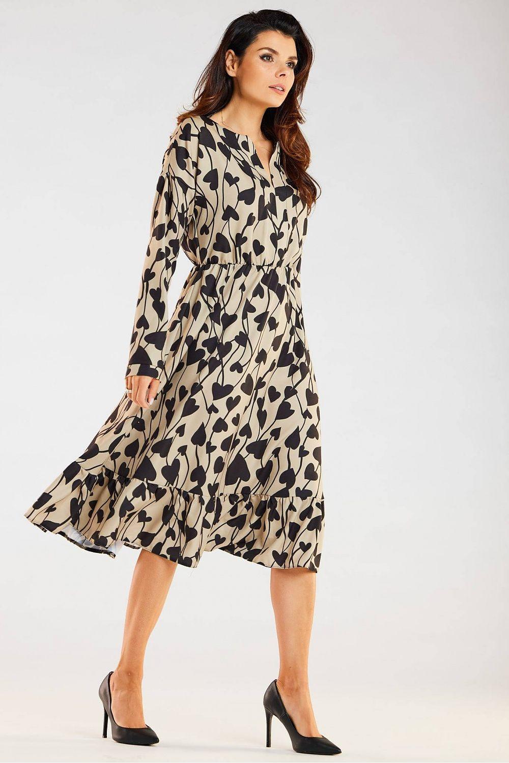 Awama daydress in beige with black heart print, long sleeves, midi length, V-neck