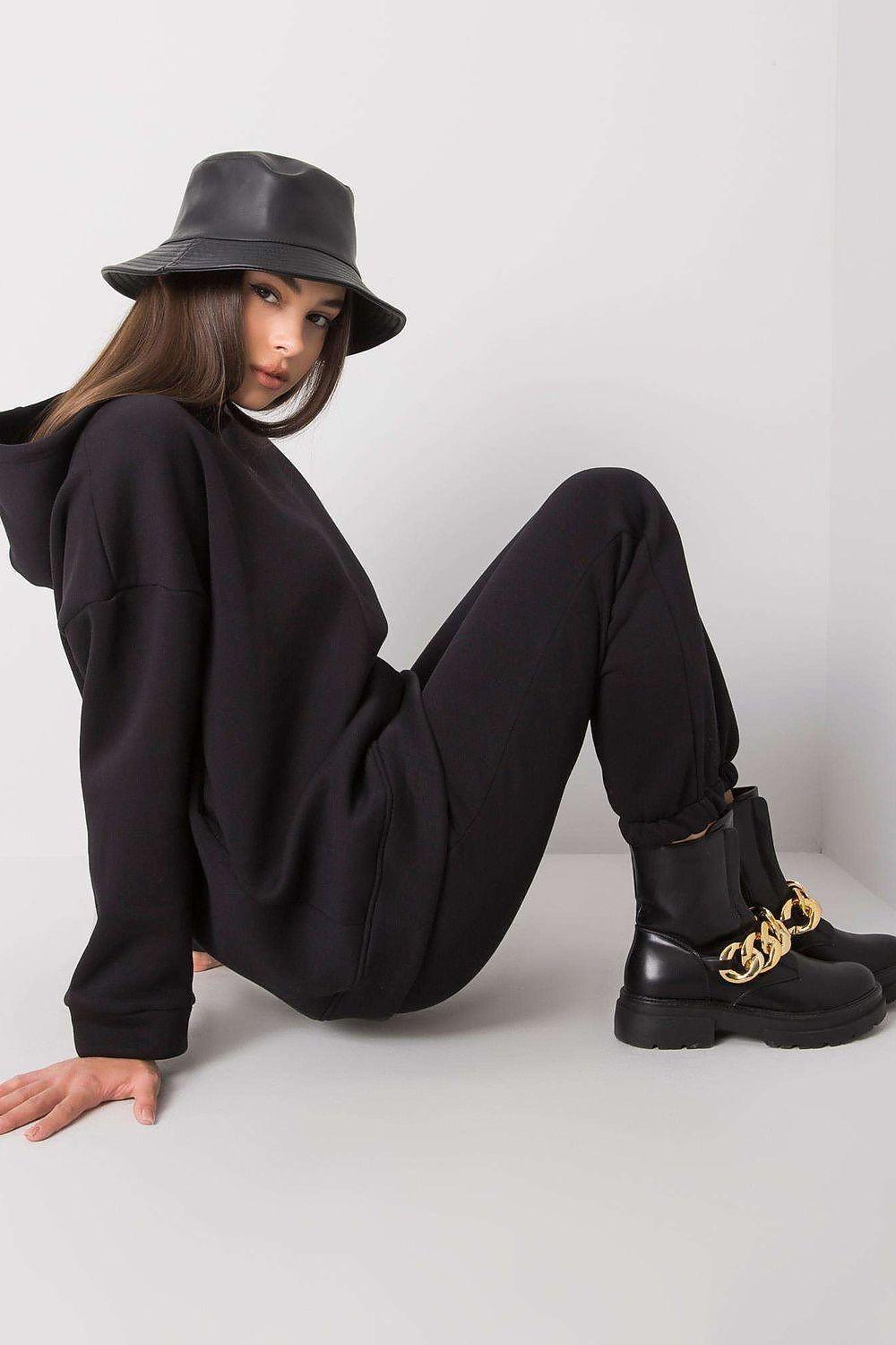 Model 176993 BFG set, black hoodie and jogger pants, seated pose