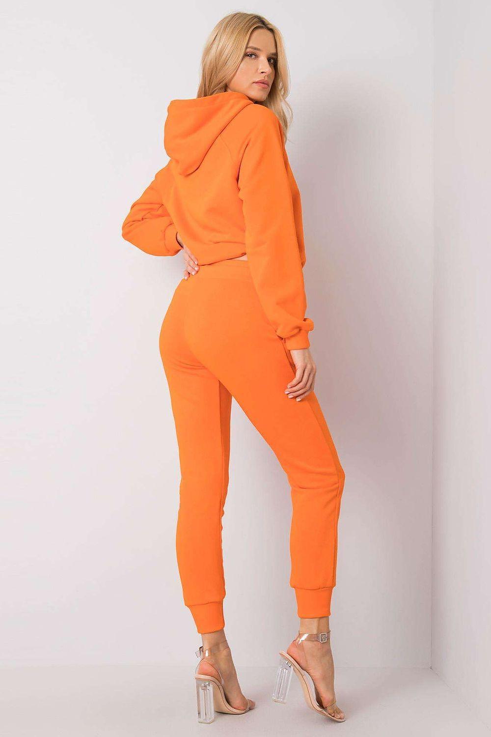 Orange tracksuit set: hoodie and jogger pants with cuffed hems and relaxed fit