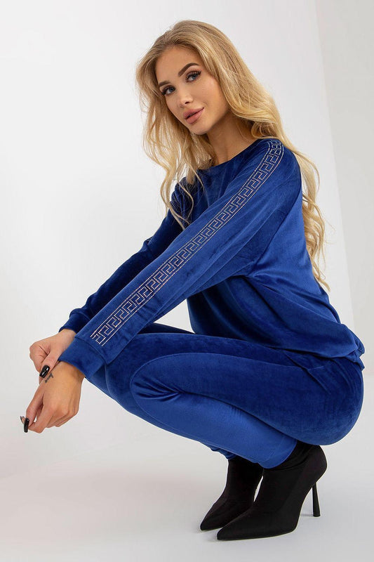 Blue velour tracksuit set with V-style trim on sleeves and matching jogger pants