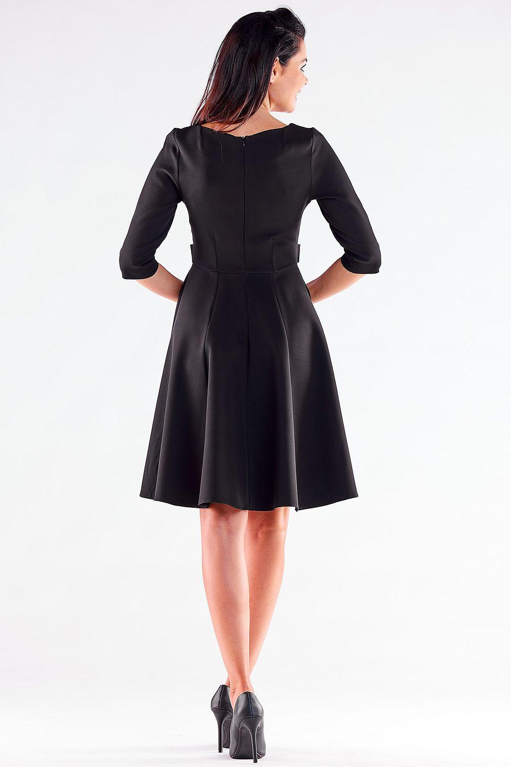Awama daydress in black, back view with flared skirt and waist seam