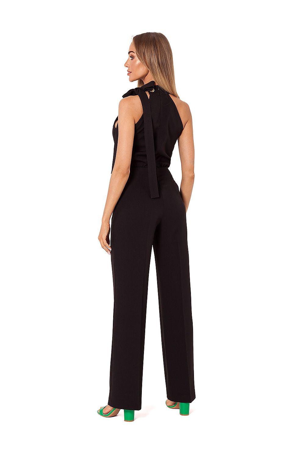 Black sleeveless jumpsuit with open back tie and wide-leg pants