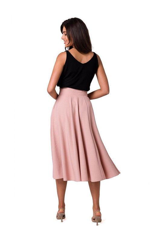 A-line midi skirt in dusty pink, pleated swing shape, back view.