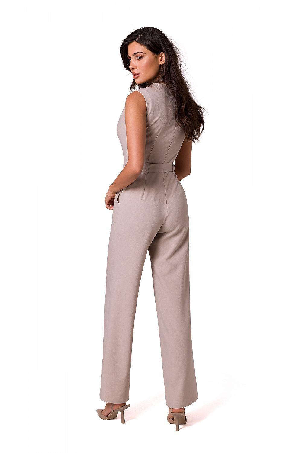 Beige sleeveless wide-leg jumpsuit, side view with waist tie