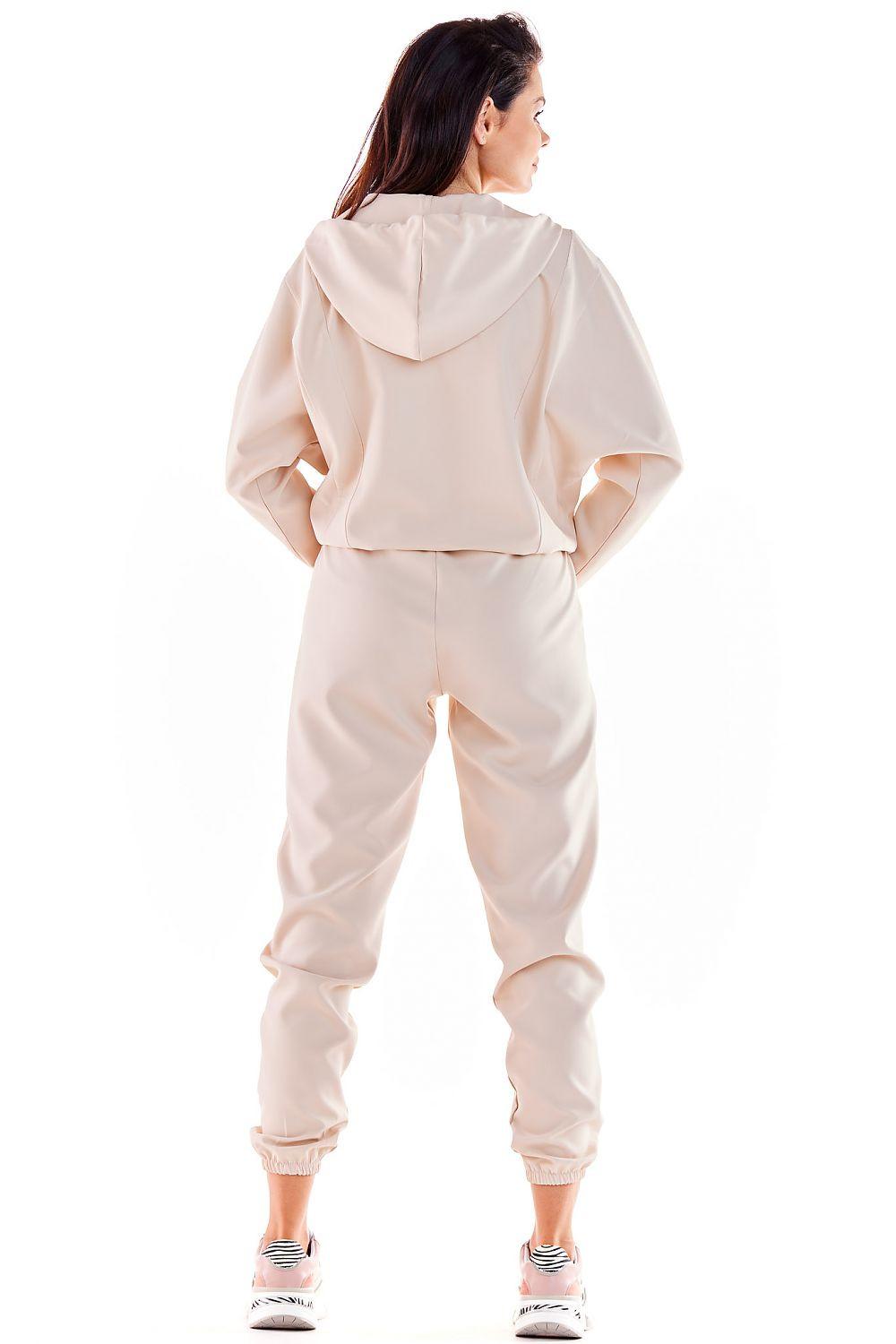 Awama tracksuit trousers, beige with elastic waist and cuffed tapered legs, rear view