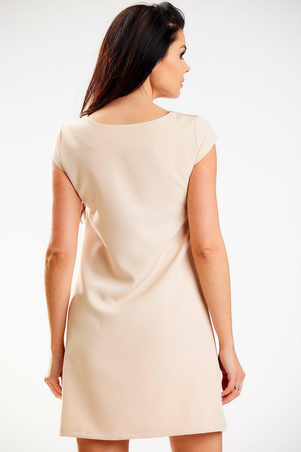 Back view sleeveless day dress in beige, A-line cut, above-knee length