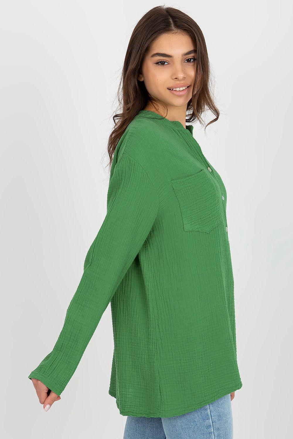 Green long-sleeve blouse with chest pocket and curved side hem