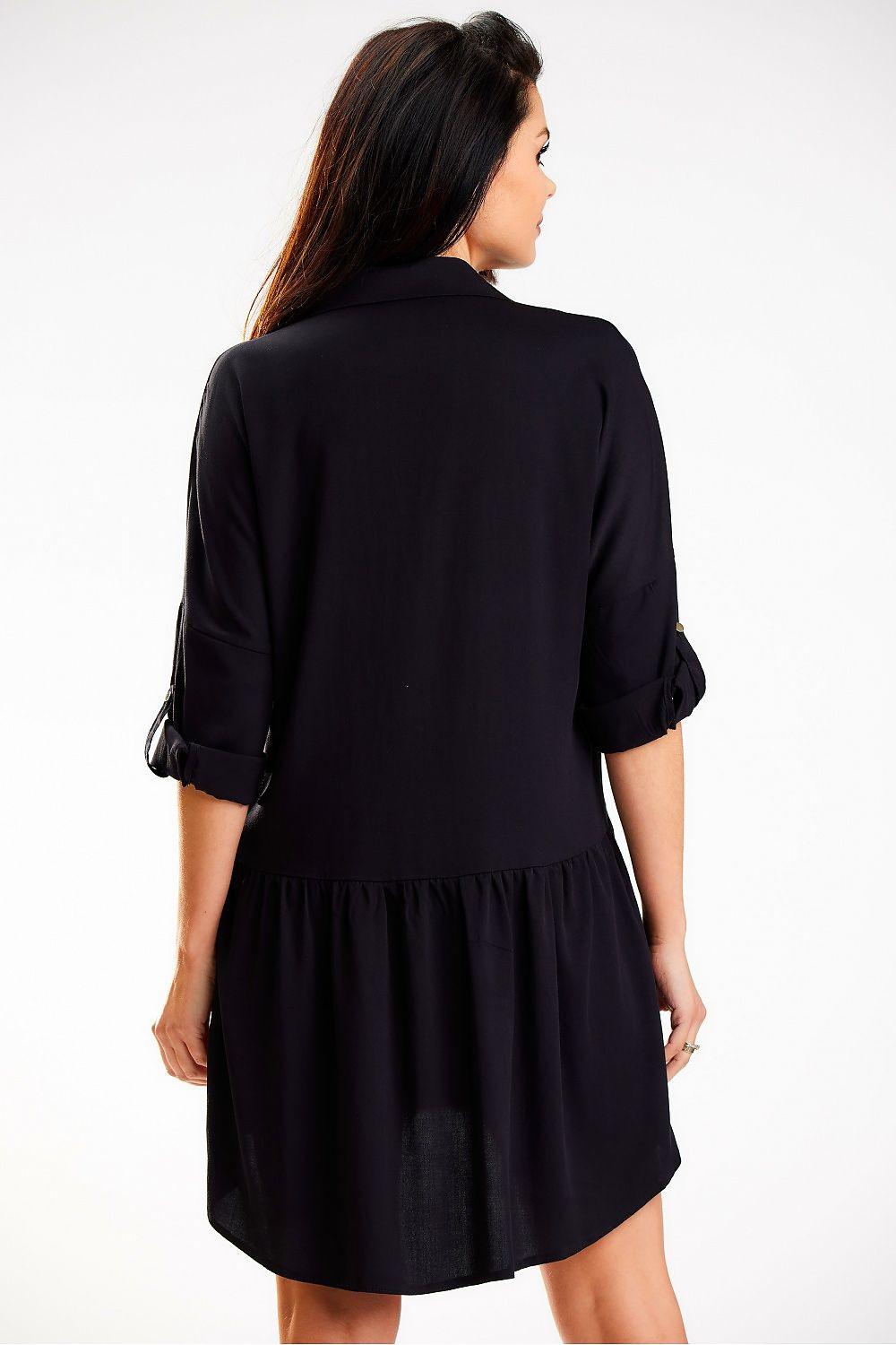 Black daydress back view with tiered hem and three-quarter sleeves, above-knee length