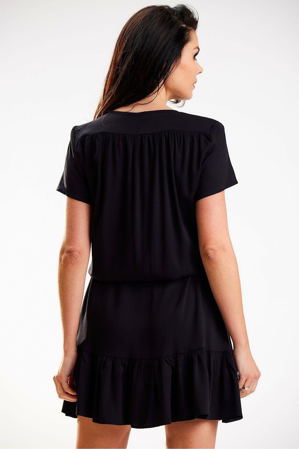 Black daydress back view with short sleeves and tiered skirt