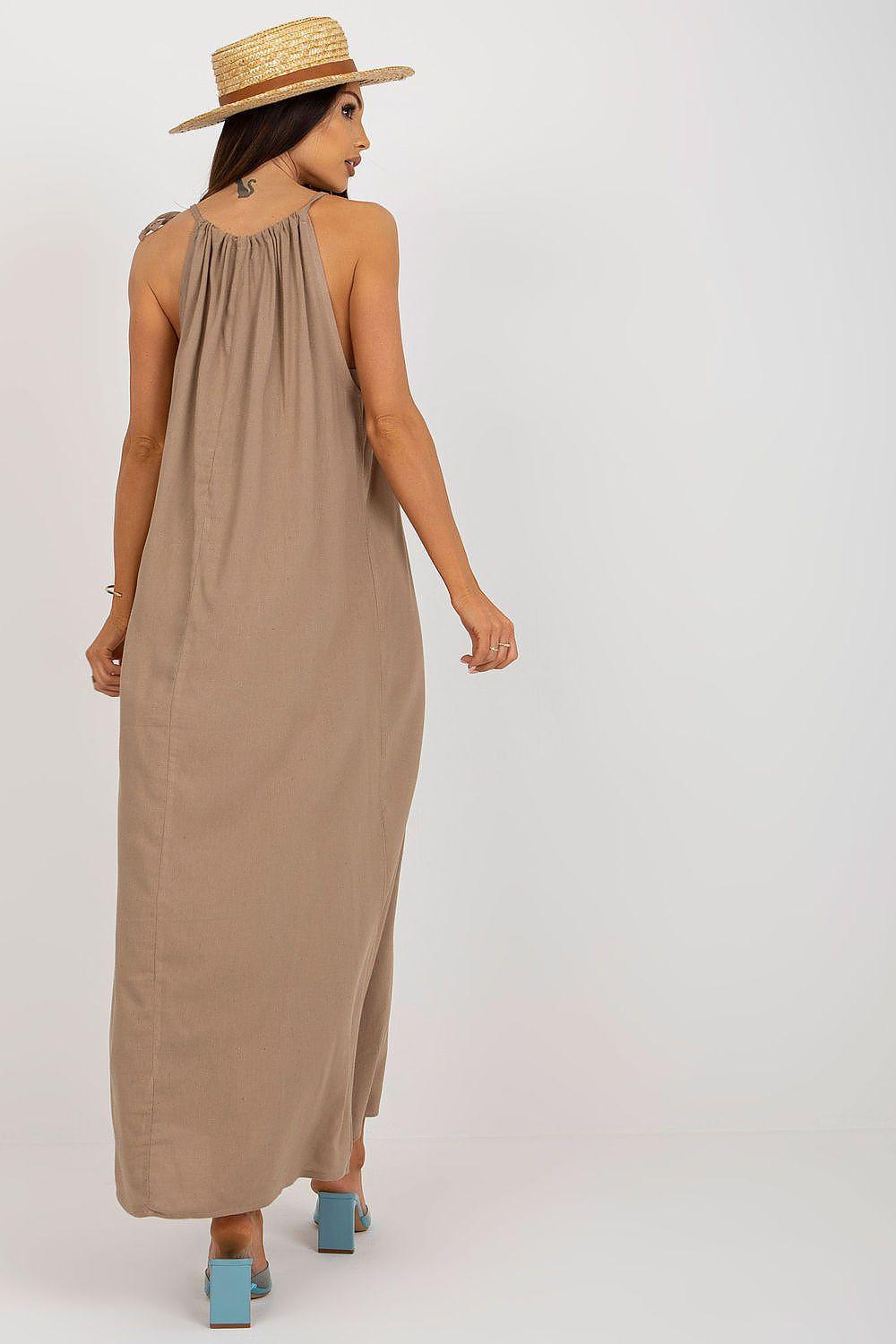Beige sleeveless halter daydress with gathered back and long straight maxi length