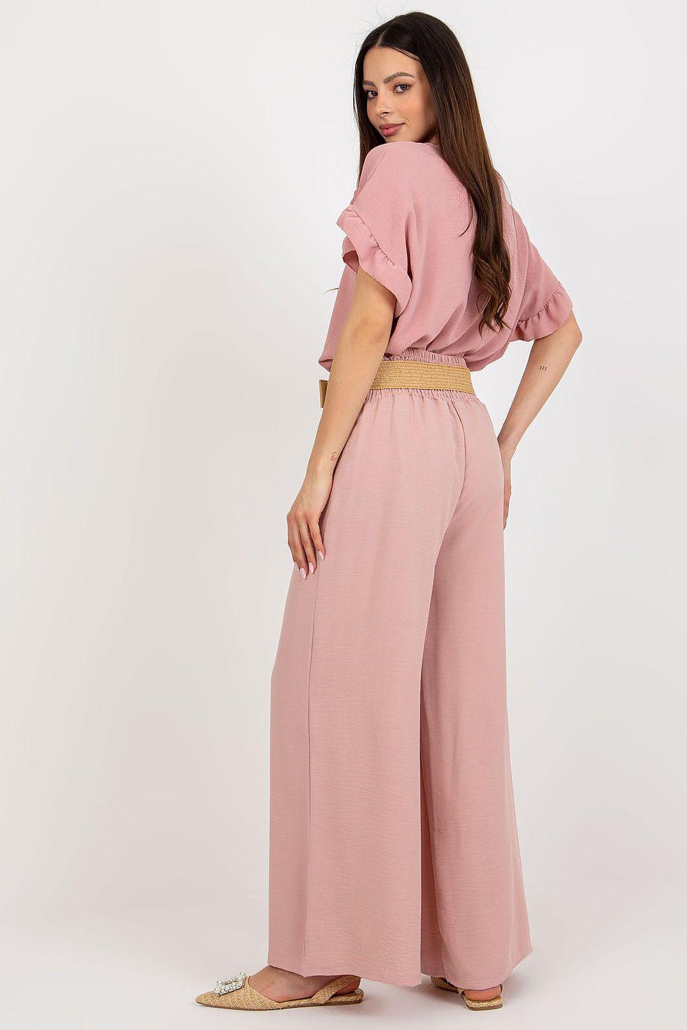 Women’s dusty pink wide-leg trousers with belted waist and gold buckle, back/side view