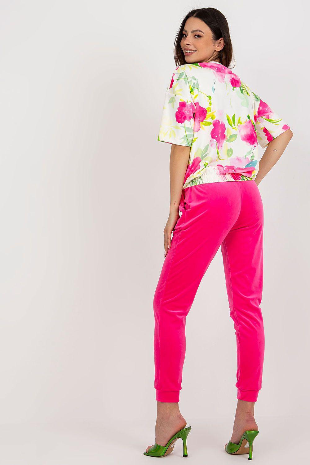 Women’s matching set: white floral short-sleeve top with bright pink jogger pants, back