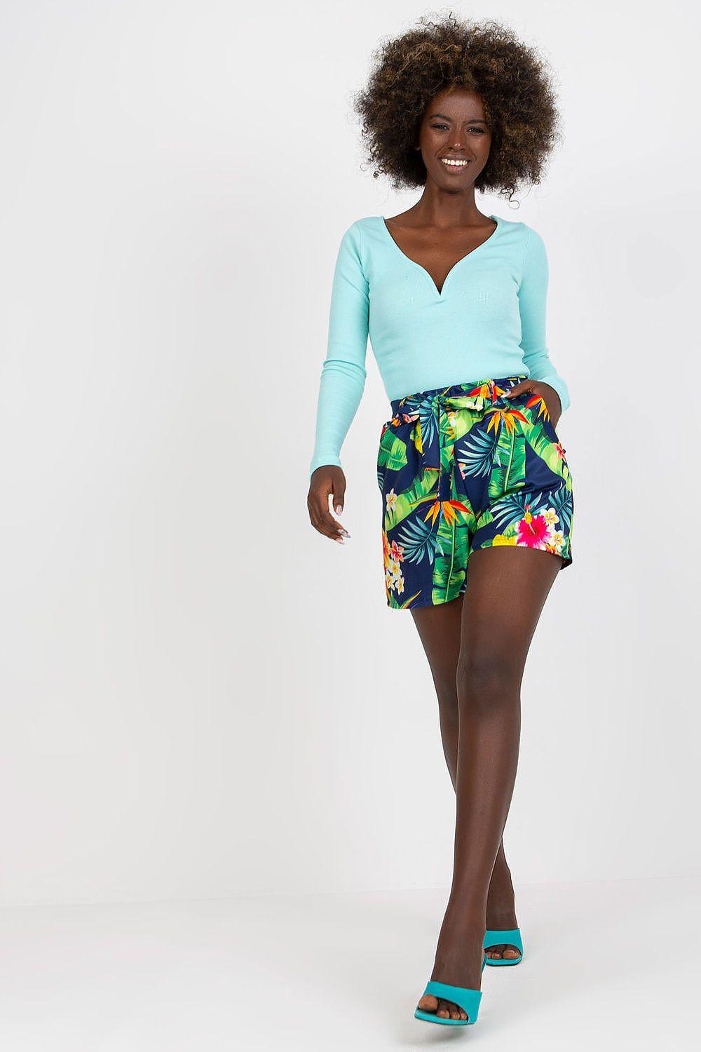 Navy botanical print shorts with colorful leaf pattern and elastic waistband