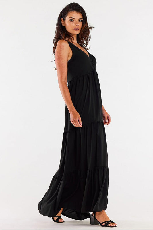 Black sleeveless V-neck maxi dress with tiered skirt and ruched waist