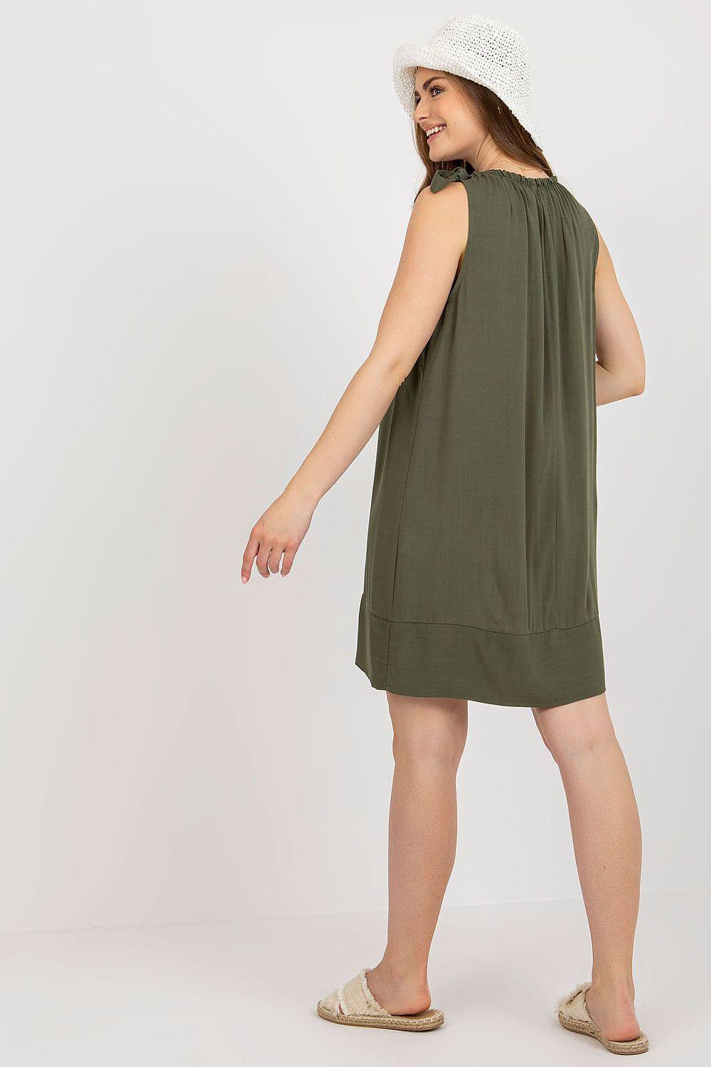 Olive green sleeveless day dress, side view with straight A-line silhouette