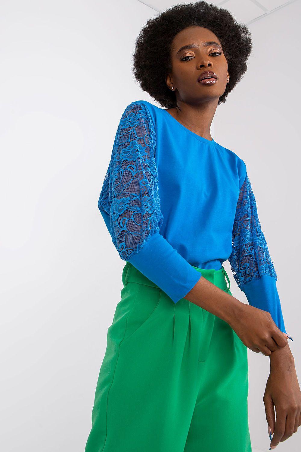 Rue Paris blue blouse with lace sleeves and round neckline, side view