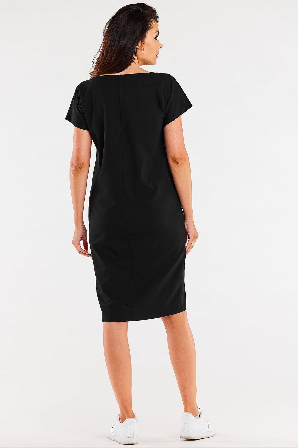 Black daydress back view, short sleeves, round neck, fitted midi length