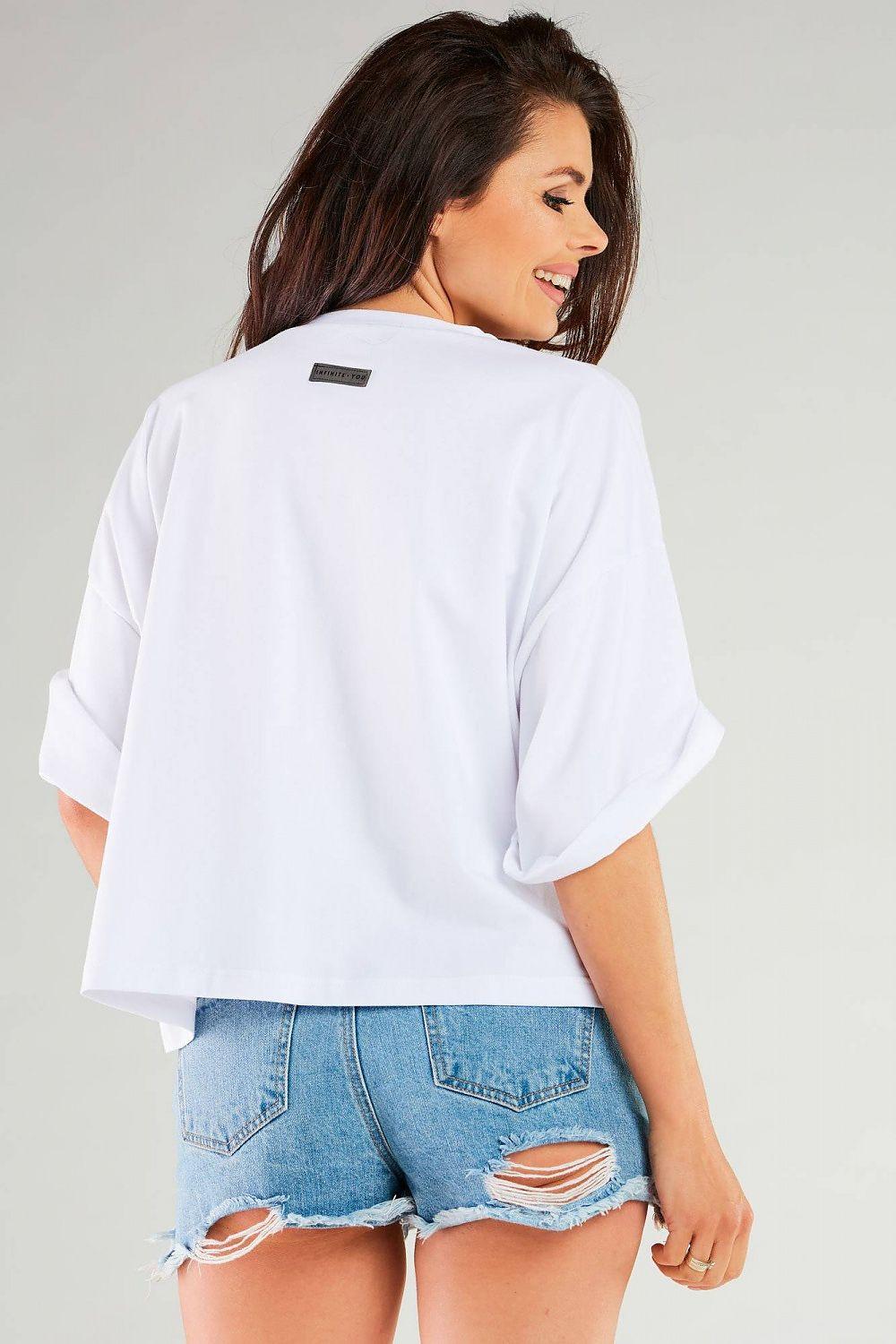 White crew-neck blouse with short sleeves, back view with small label