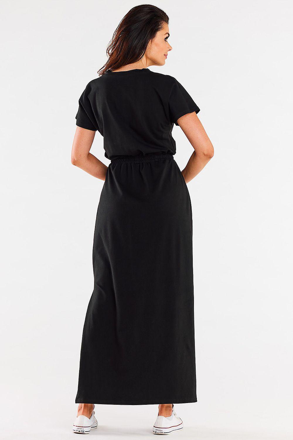 Black daydress with short sleeves and gathered waist, back view.