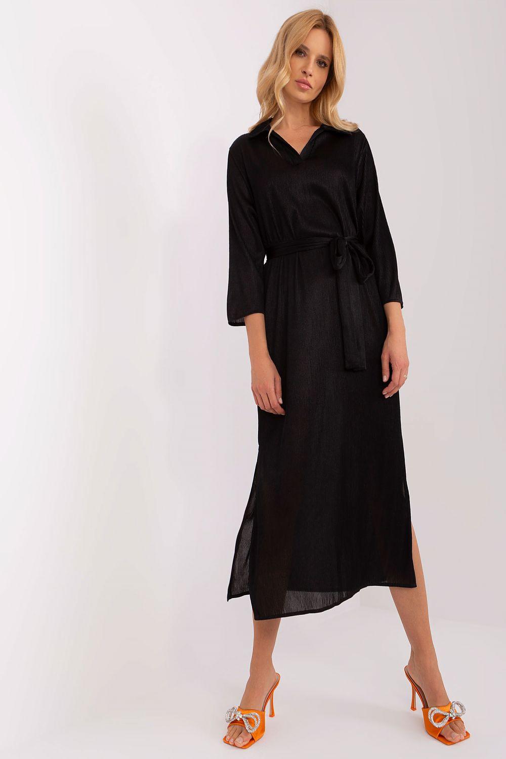 Black daydress with V-neck, tie belt, 3/4 sleeves, and front slit
