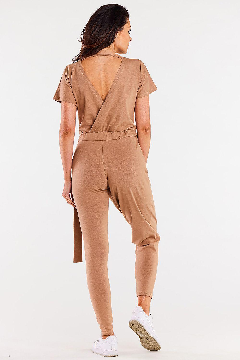 Beige V-neck short-sleeve jumpsuit with open back and waist seam