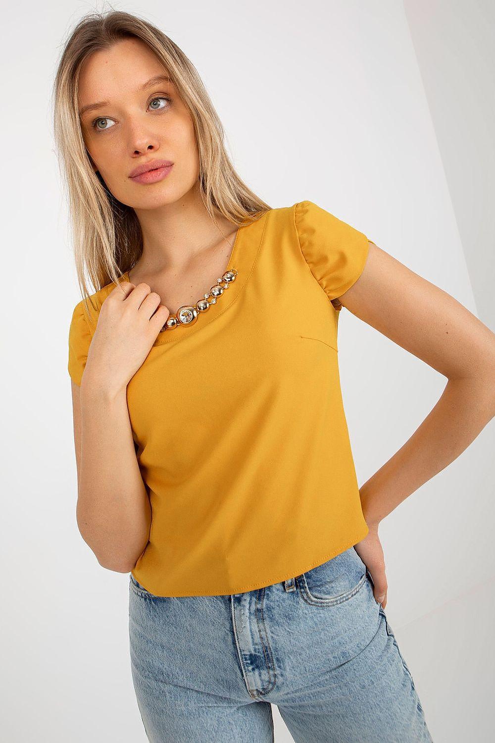 Yellow blouse with jewel-embellished neckline and puff sleeves
