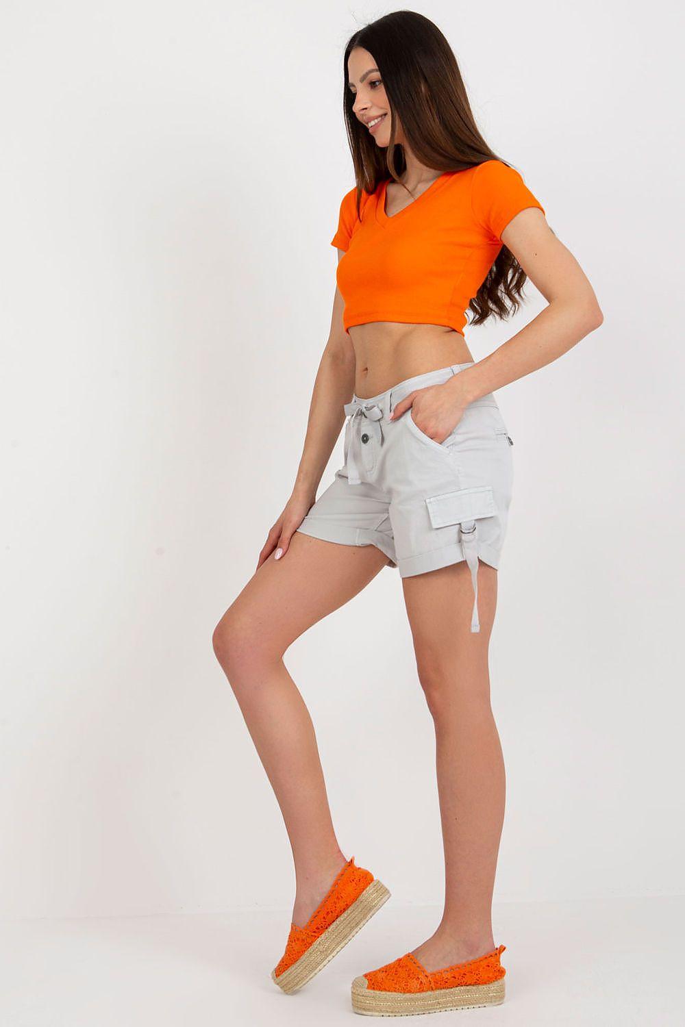 Light grey cargo shorts with side ties, multiple pockets, belt loops and button closure.