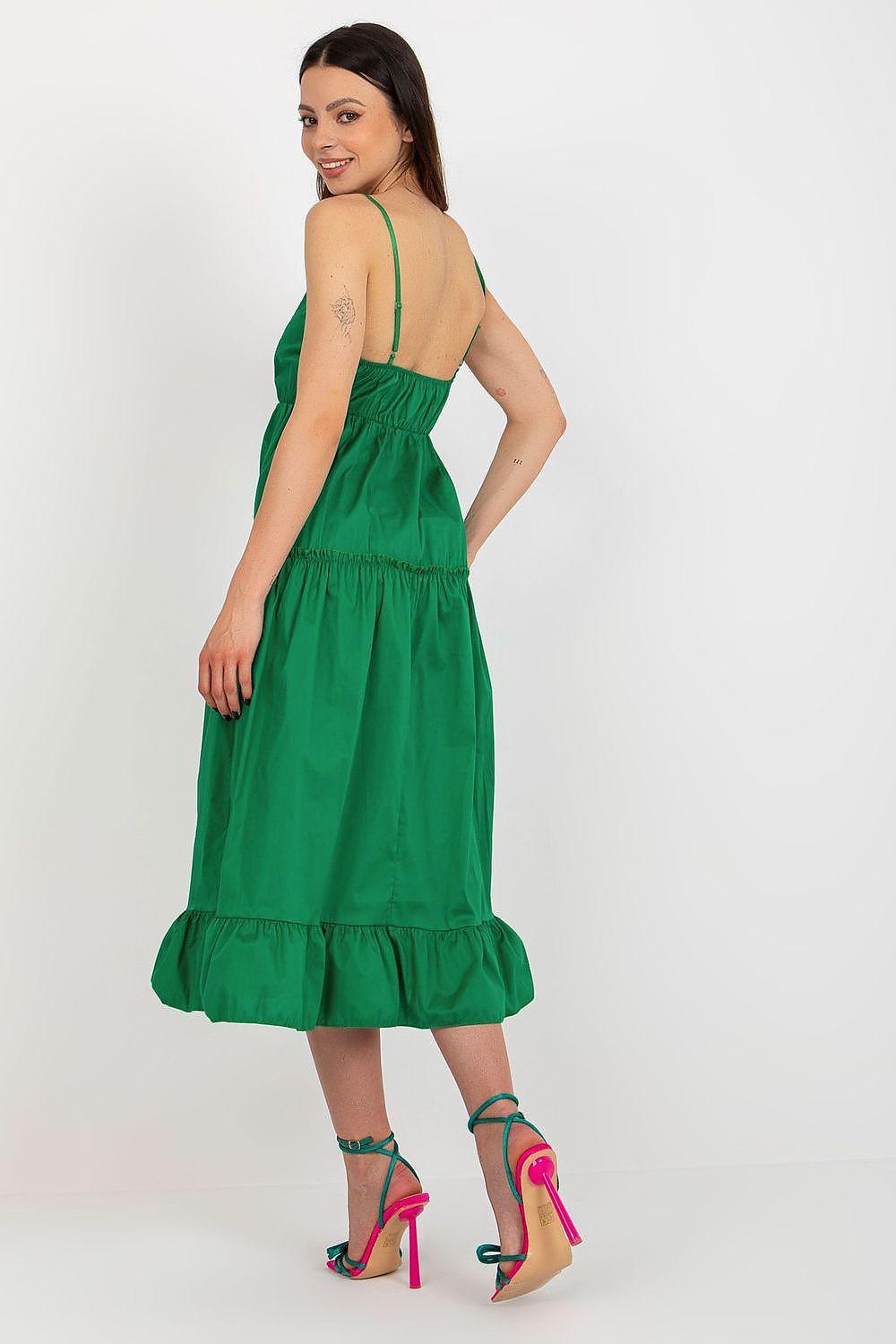 Green daydress with spaghetti straps and tiered skirt, backless