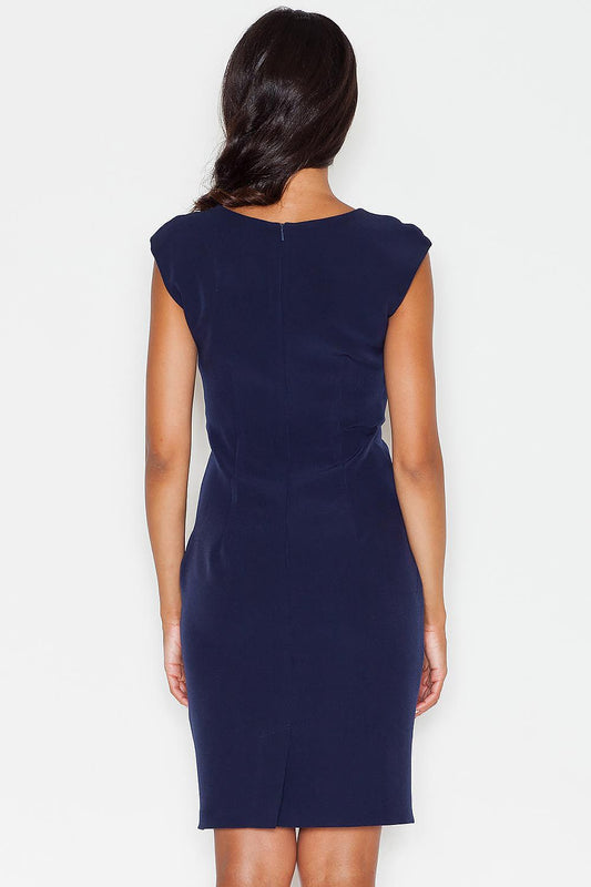Back view navy daydress with cap sleeves and straight hem.