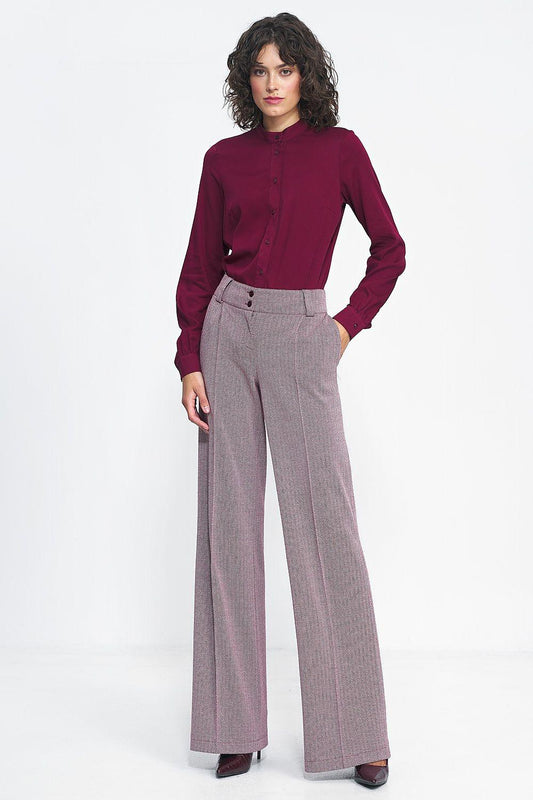 High-waist wide-leg trousers in light mauve with front button and side pockets.