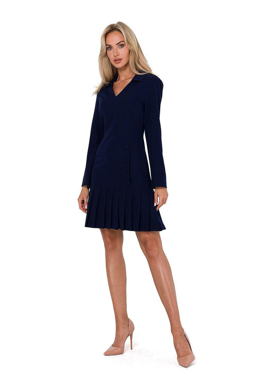 Navy daydress with V-neck and long sleeves, button detail, pleated hem.