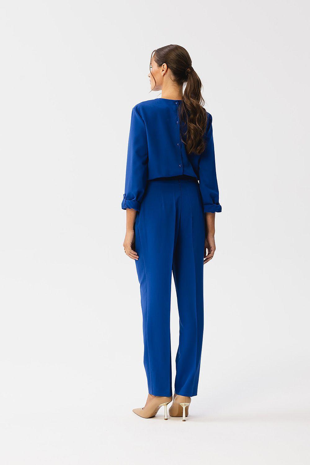 Blue two-piece pantsuit, back view, with long sleeves and slim leg trousers