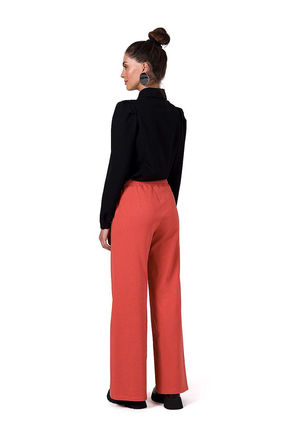 Women trousers by BeWear, coral orange, high-waist wide-leg trousers from the back